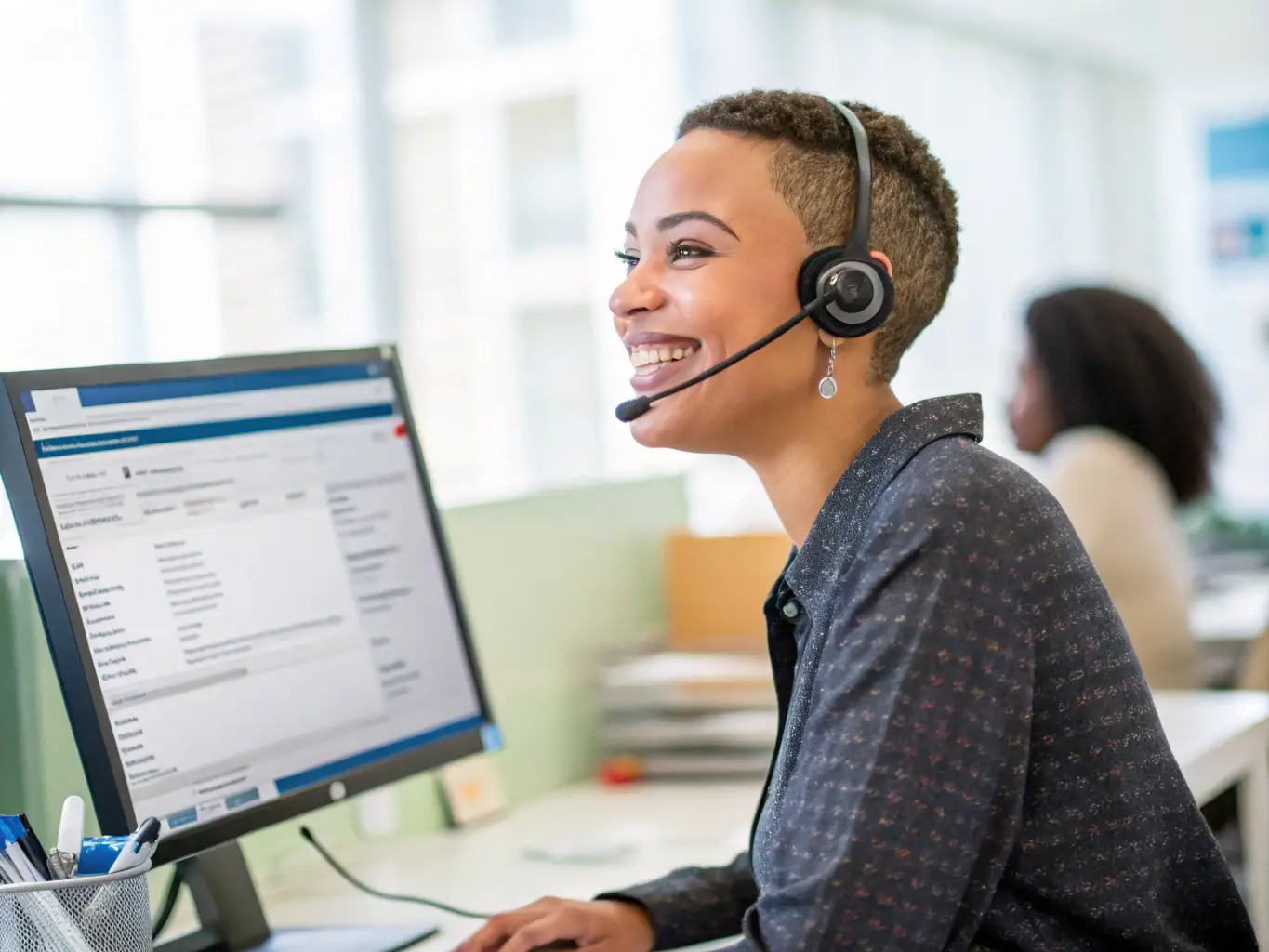 A friendly and helpful support agent assisting a customer via live chat, demonstrating Shipsmooth's commitment to providing responsive and personalized support.
